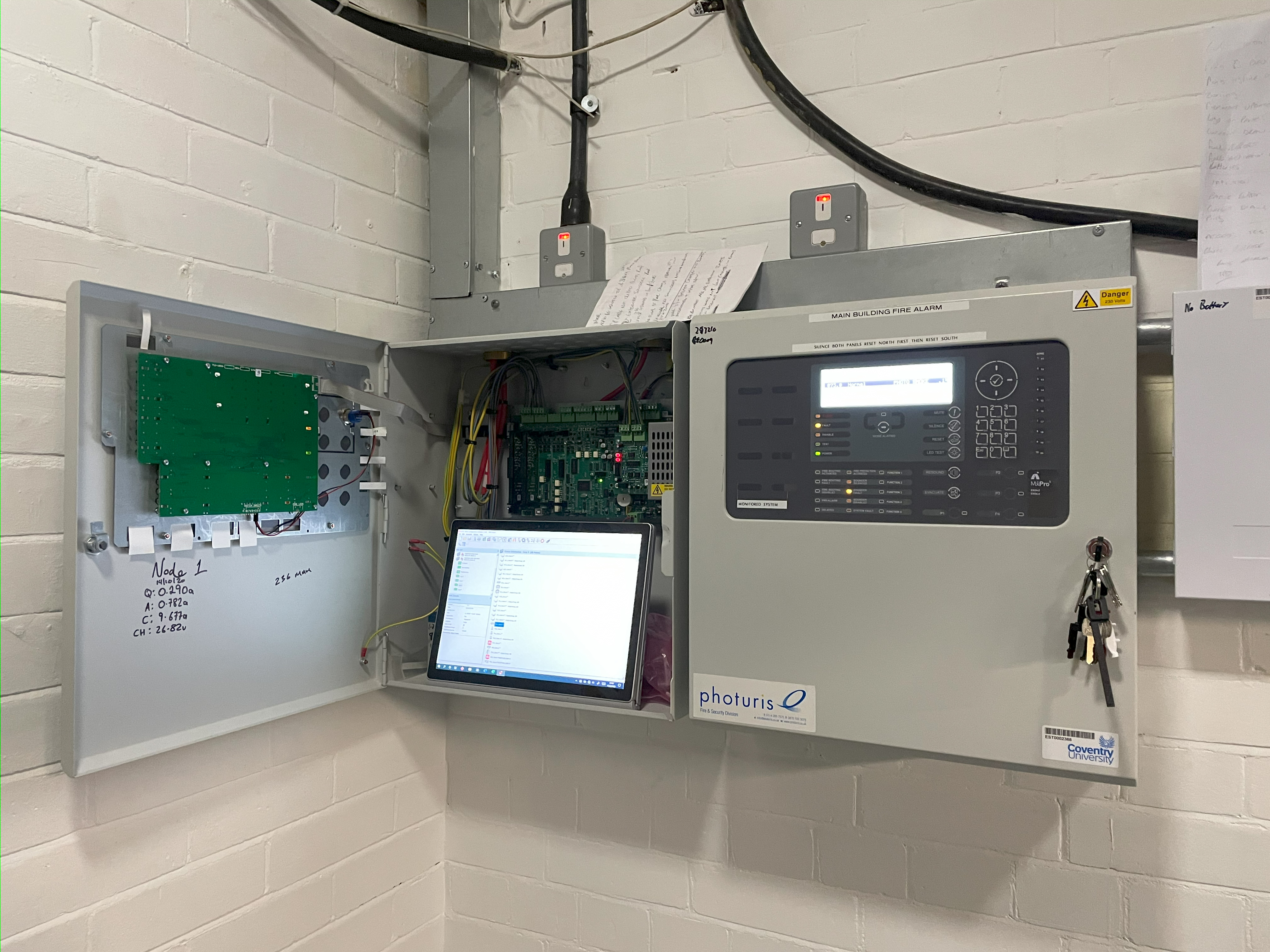 Photuris engineer commissioning a fire alarm panel